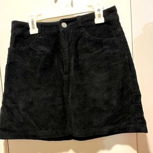 Black corduroy mini skirt
